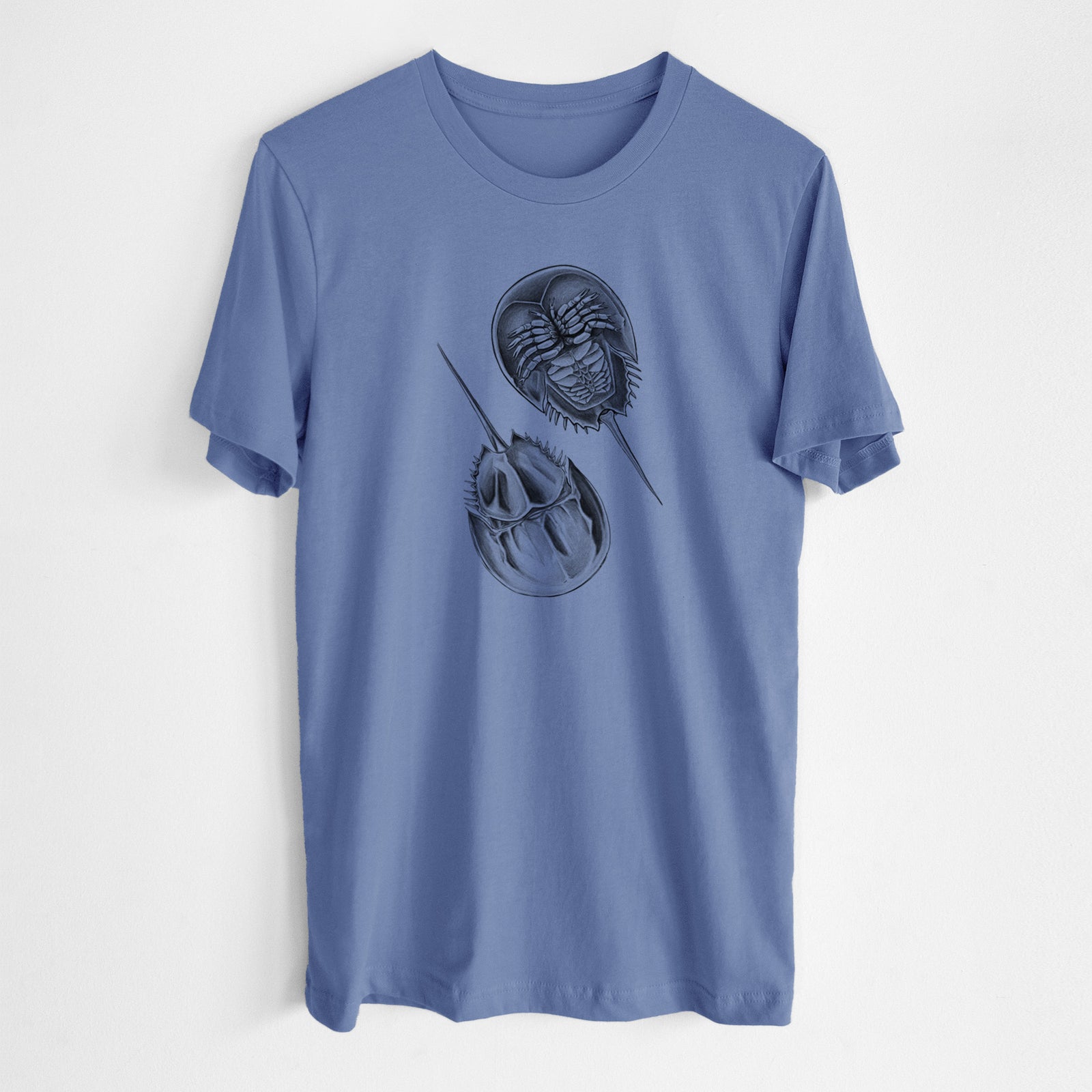Blue bell lightweight cotton t-shirt laid flat, printed with a detailed black ink illustration of two horseshoe crabs.