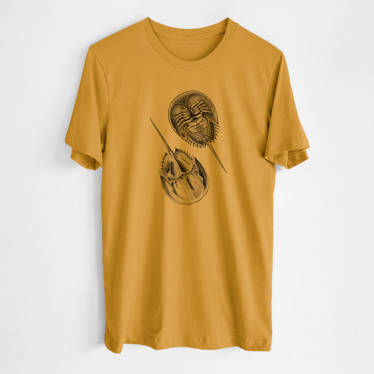 Honeycomb yellow lightweight cotton t-shirt laid flat, printed with a detailed black ink illustration of two horseshoe crabs.