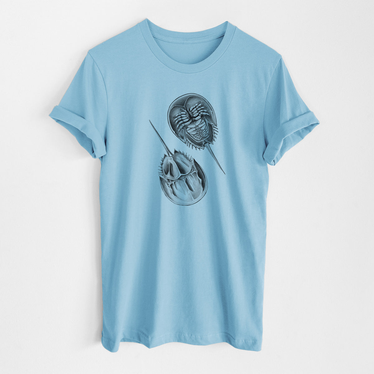 Ocean blue lightweight cotton t-shirt laid flat, printed with a detailed black ink illustration of two horseshoe crabs.
