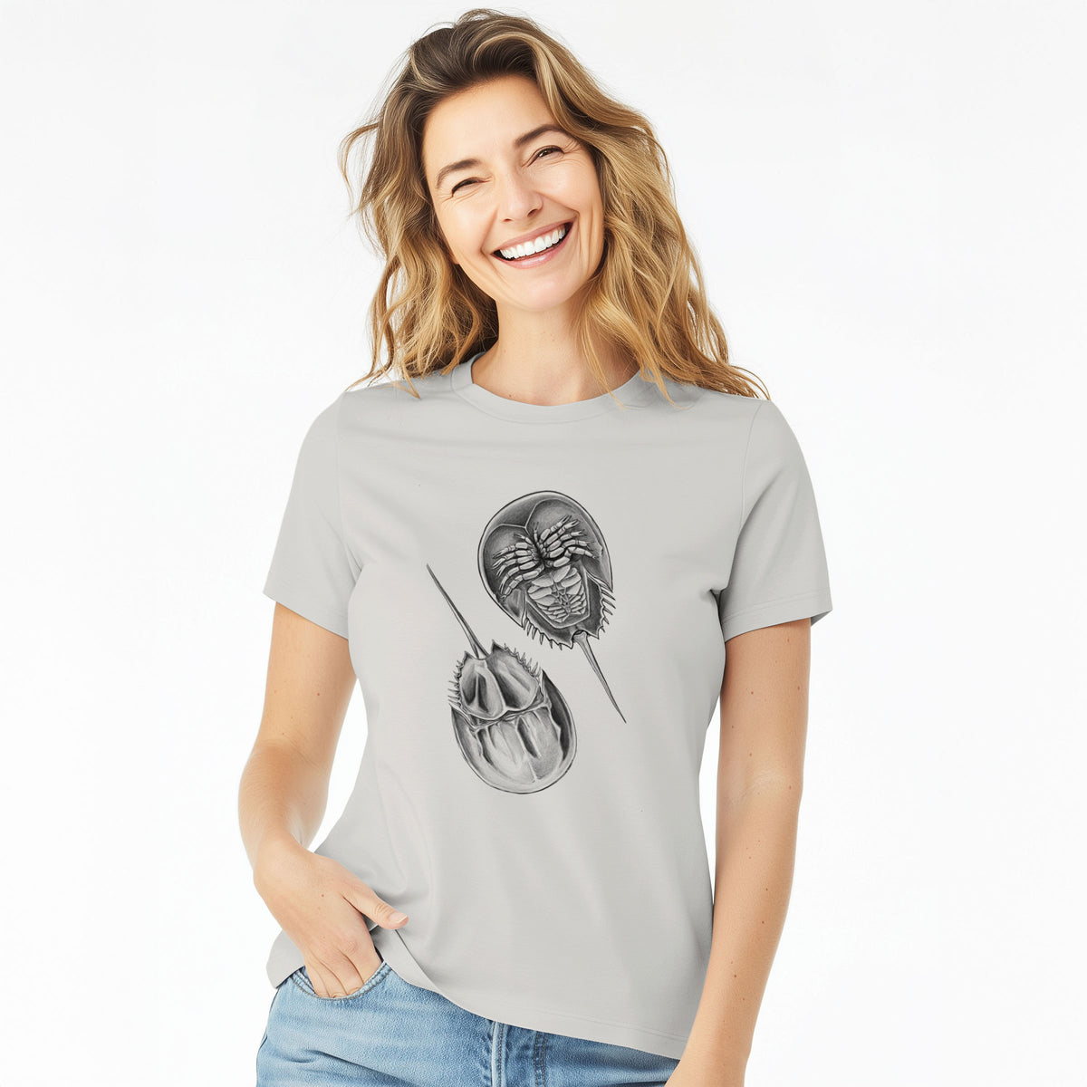 Woman wearing a lunar grey women's relaxed fit cotton t-shirt printed with a detailed black ink illustration of two horseshoe crabs.