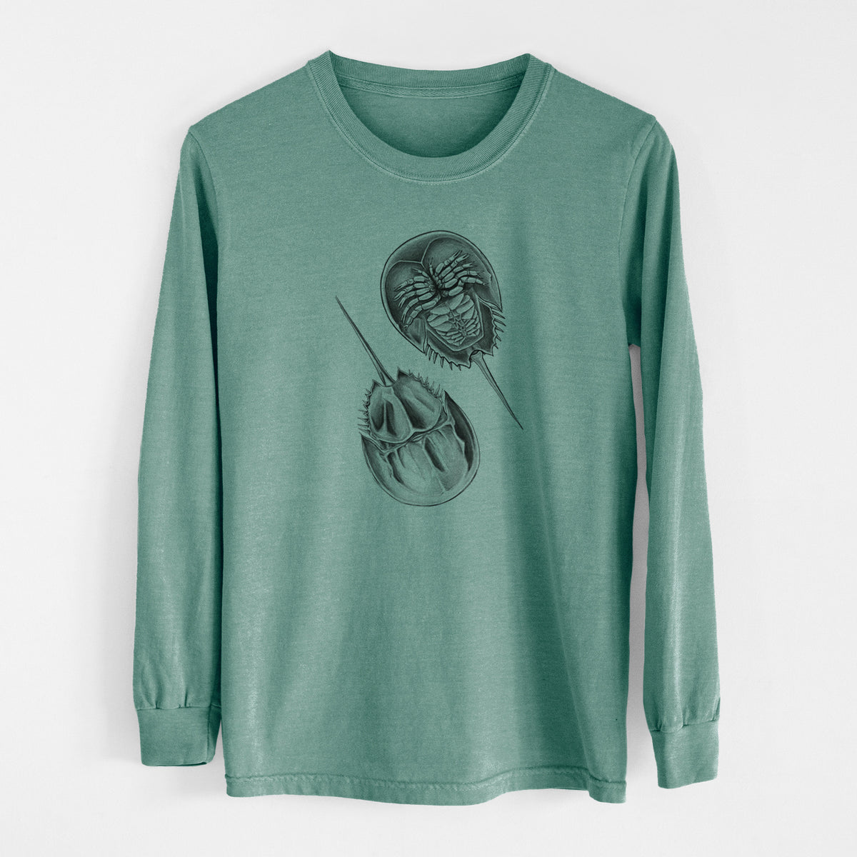 Pine green Comfort Colors long sleeve shirt laid flat, printed with a detailed black ink illustration of two horseshoe crabs.