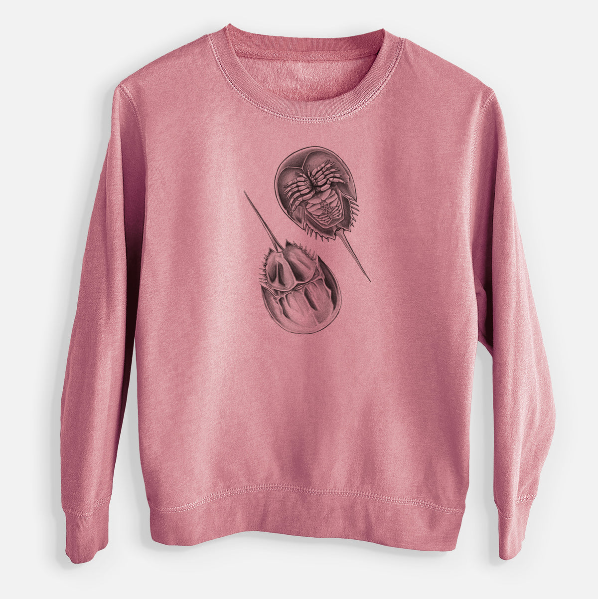Mauve pink youth crewneck sweatshirt laid flat, printed with a detailed black ink illustration of two horseshoe crabs.