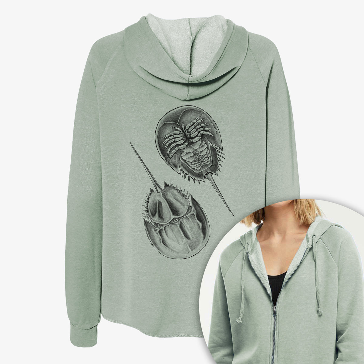 Women's Cali Wave zip-up sweatshirt printed with a detailed black ink illustration of two horseshoe crabs, with a close-up of the zipper.