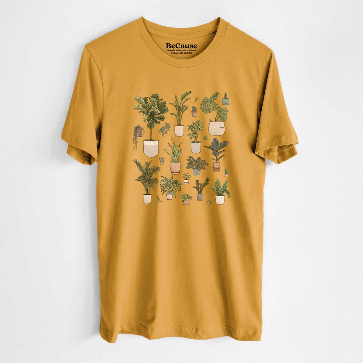 Mustard yellow lightweight cotton t-shirt laid flat, printed with a full-color collection of potted houseplants in different pots.