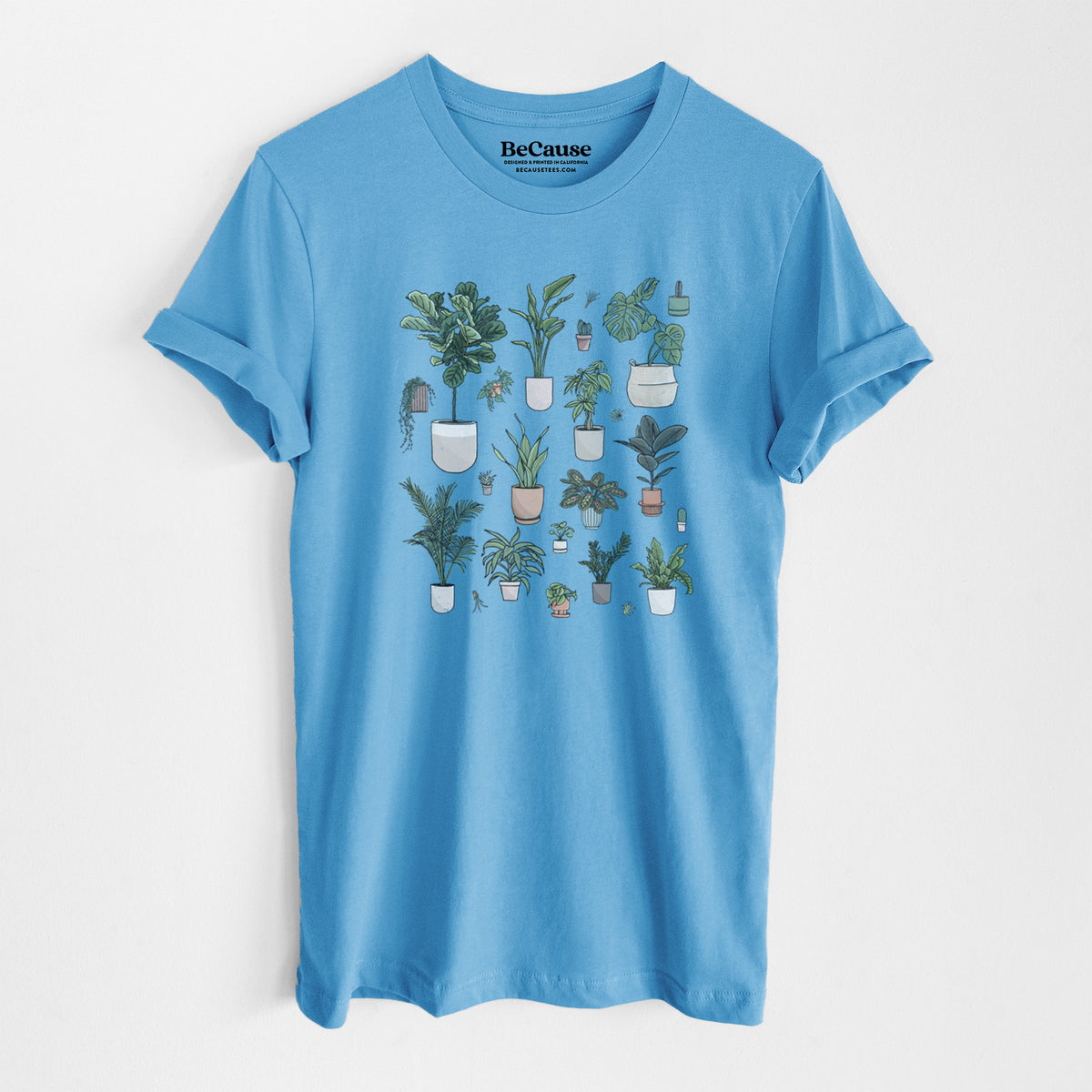 Ocean blue lightweight cotton t-shirt laid flat, printed with a full-color collection of potted houseplants in different pots.