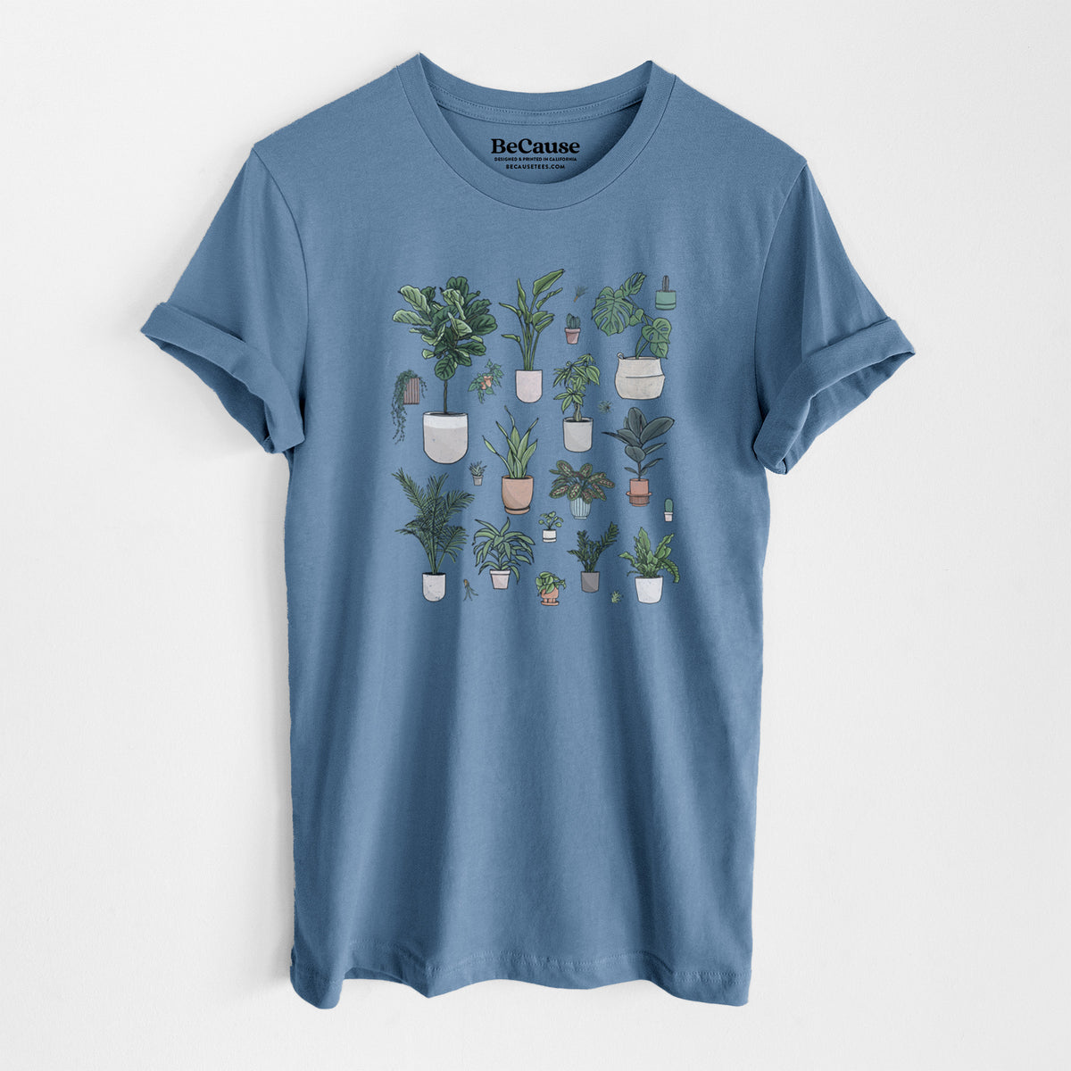 Steel blue lightweight cotton t-shirt laid flat, printed with a full-color collection of potted houseplants in different pots.