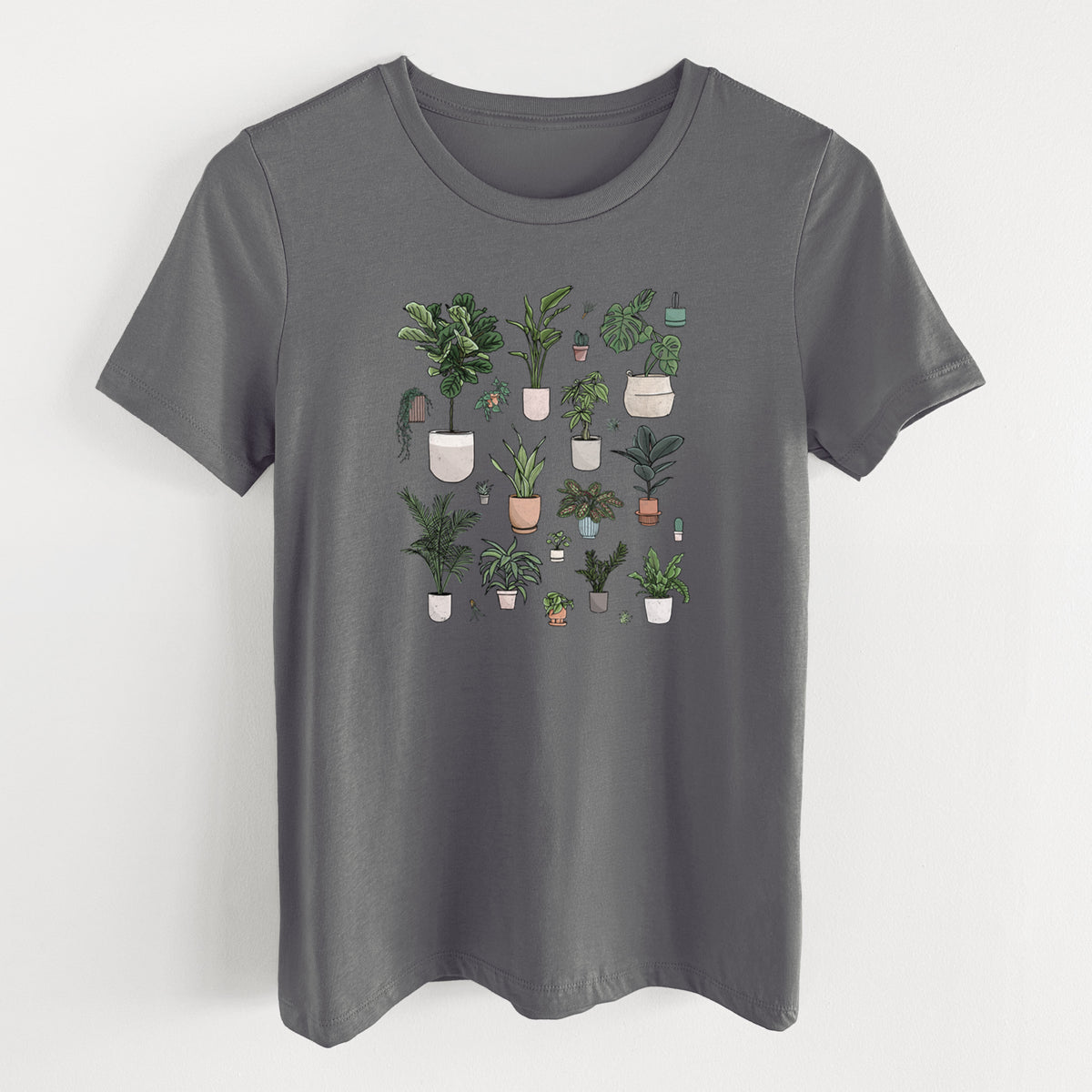 Asphalt women's relaxed fit cotton t-shirt laid flat, printed with a full-color collection of potted houseplants in different pots.