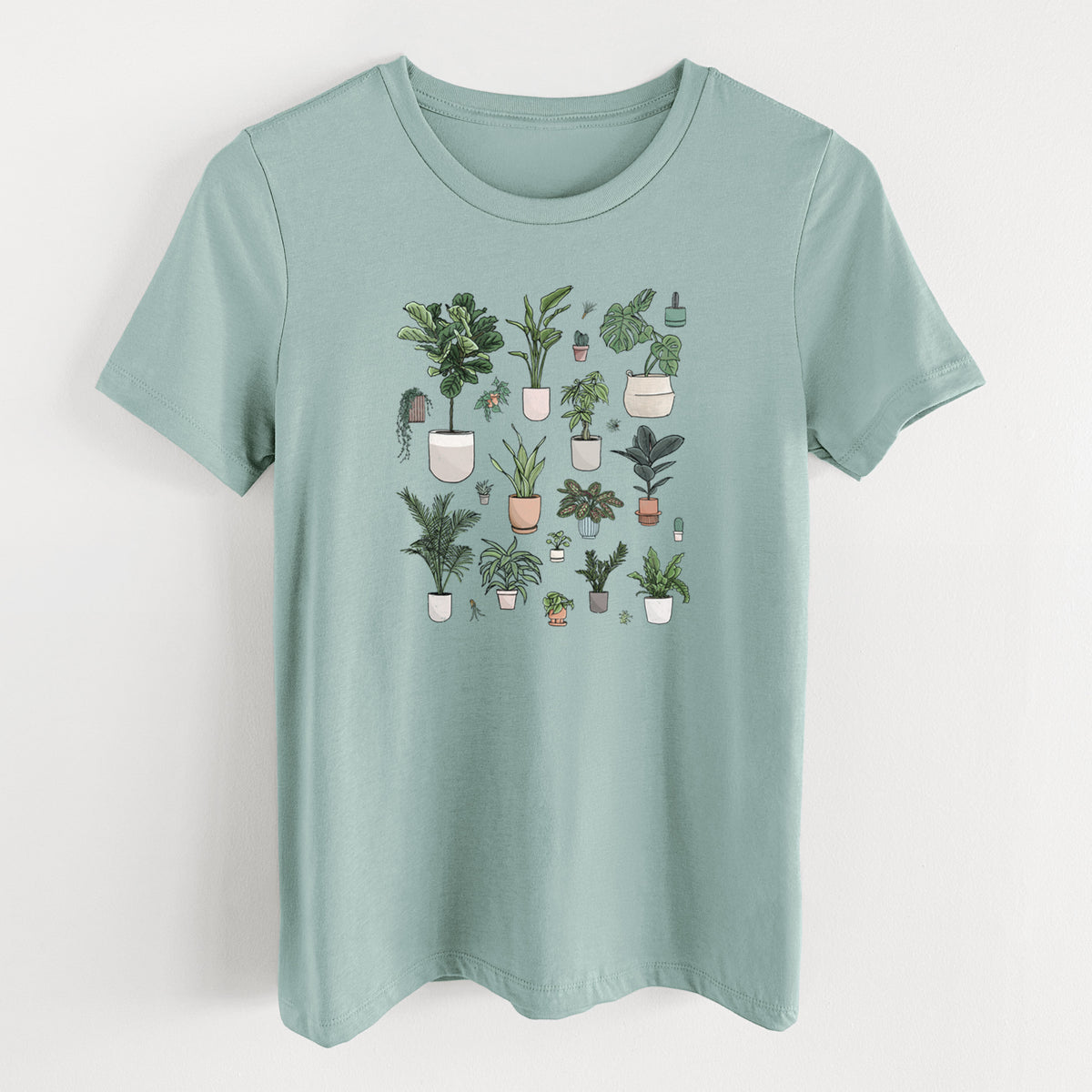 Dusty blue women's relaxed fit cotton t-shirt laid flat, printed with a full-color collection of potted houseplants in different pots.