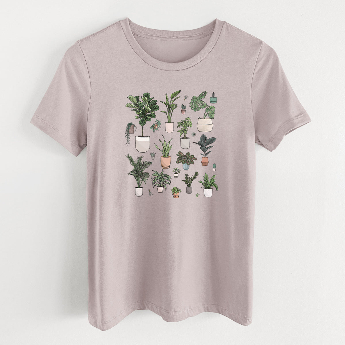 Pink gravel women's relaxed fit cotton t-shirt laid flat, printed with a full-color collection of potted houseplants in different pots.