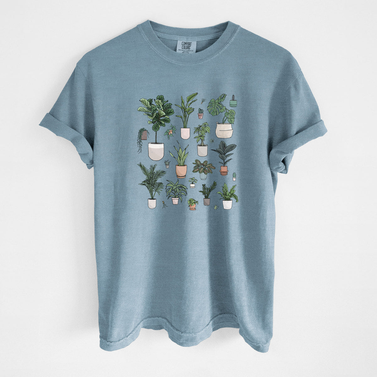 Steel blue Comfort Colors t-shirt laid flat, printed with a full-color collection of potted houseplants in different pots.