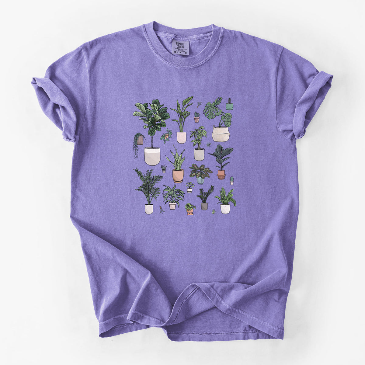 Violet purple Comfort Colors t-shirt laid flat, printed with a full-color collection of potted houseplants in different pots.