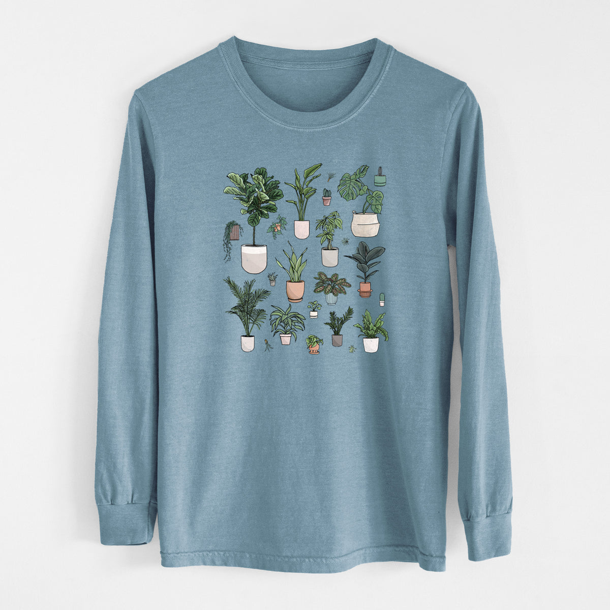 Steel blue Comfort Colors long sleeve shirt laid flat, printed with a full-color collection of potted houseplants in different pots.