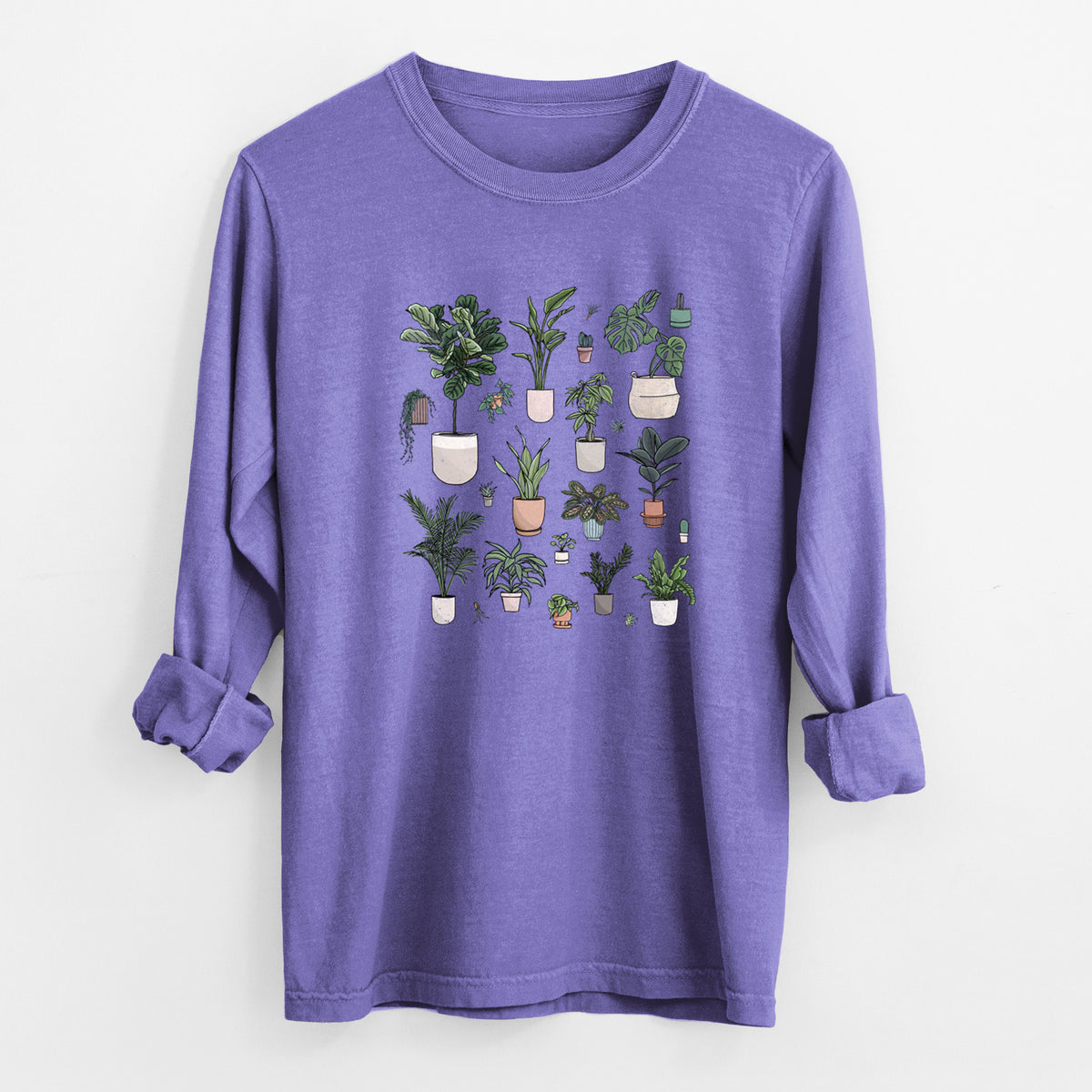 Violet purple Comfort Colors long sleeve shirt laid flat with the cuffs rolled, printed with a full-color collection of potted houseplants in different pots.