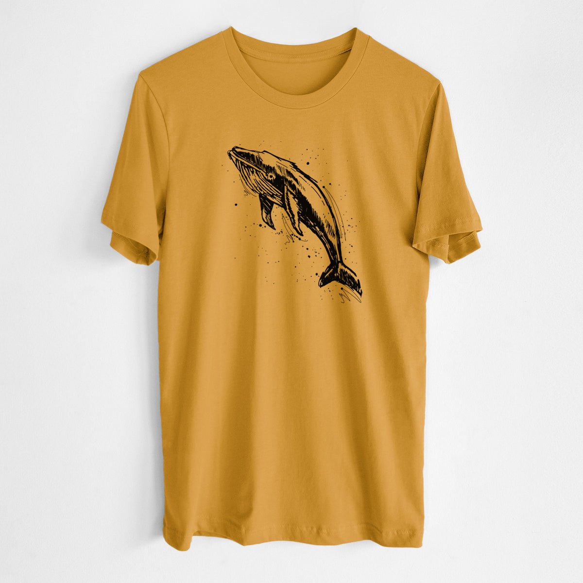 Honeycomb yellow lightweight cotton t-shirt laid flat, printed with a black ink illustration of a humpback whale diving, with ink splatters.