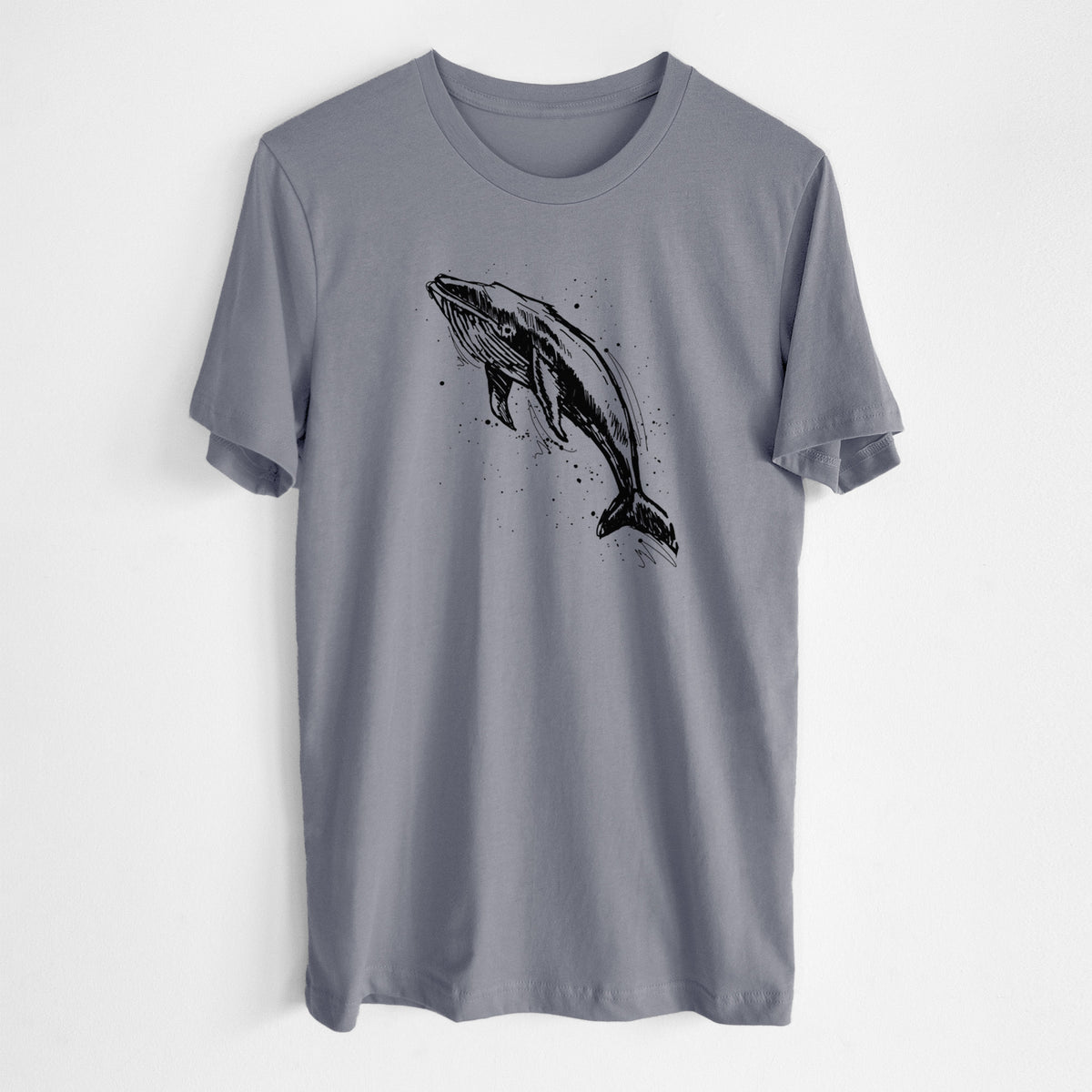 Storm grey lightweight cotton t-shirt laid flat, printed with a black ink illustration of a humpback whale diving, with ink splatters.