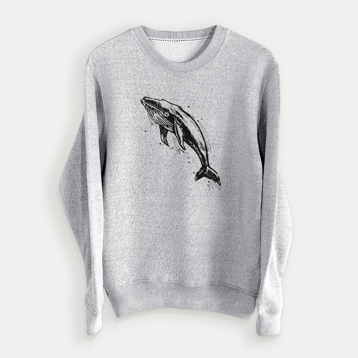 Salt and pepper knit sweatshirt laid flat, printed with a black ink illustration of a humpback whale diving, with ink splatters.