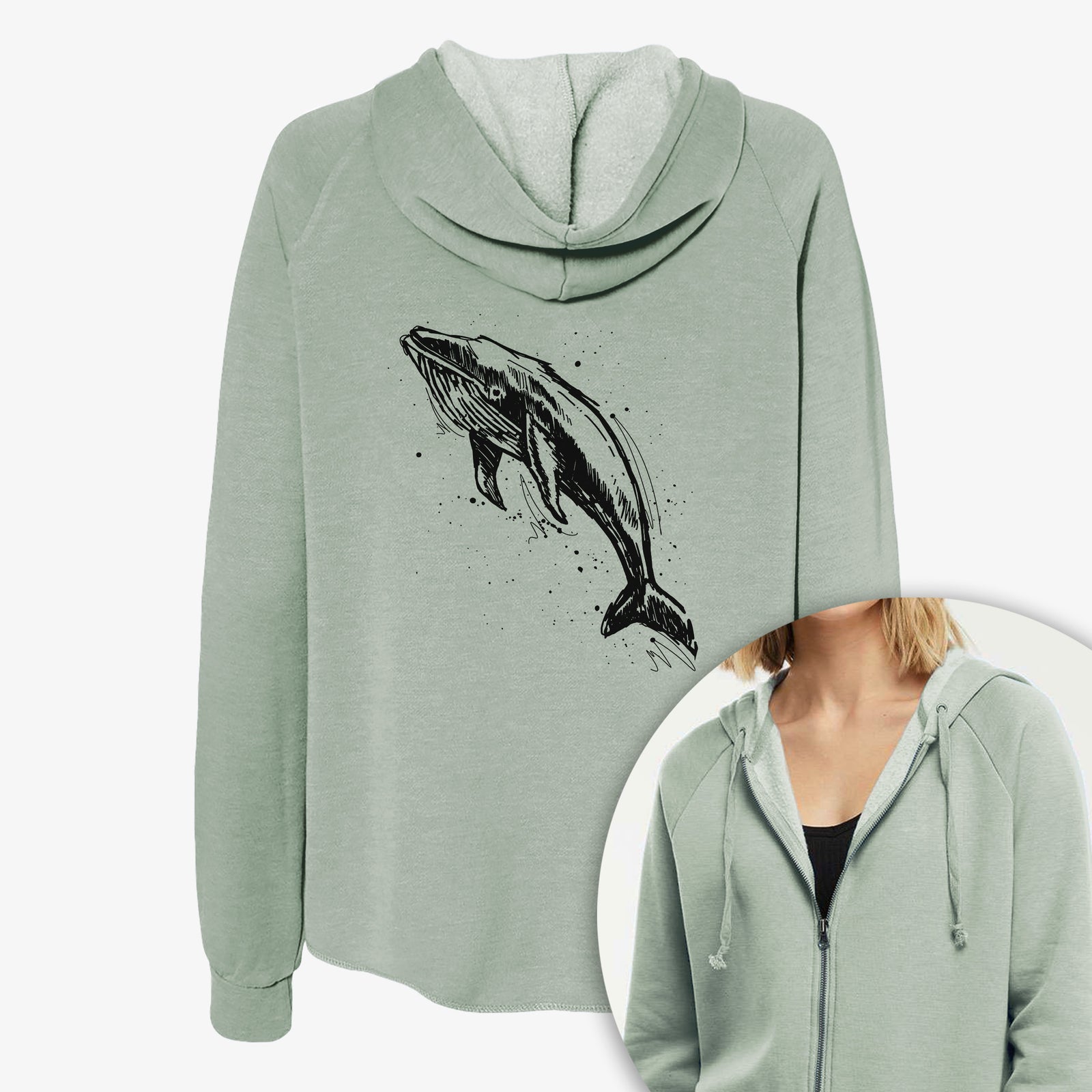 Women's Cali Wave zip-up sweatshirt printed with a black ink illustration of a humpback whale diving, with ink splatters, with a close-up of the zipper.