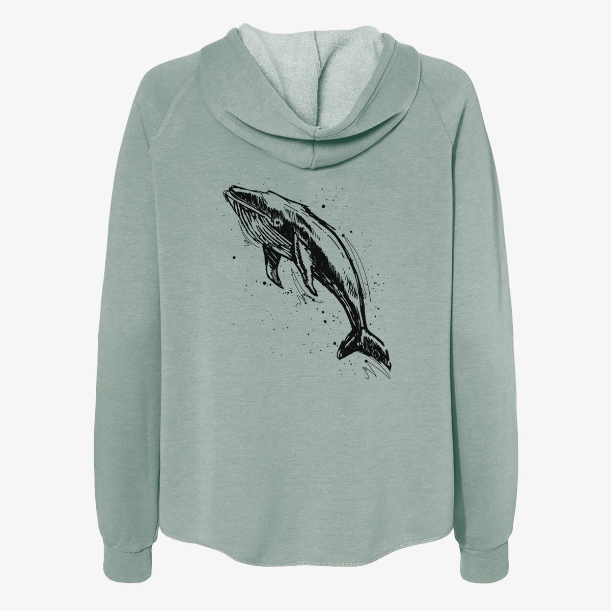 Sage green women's Cali Wave zip-up sweatshirt laid flat, printed with a black ink illustration of a humpback whale diving, with ink splatters.
