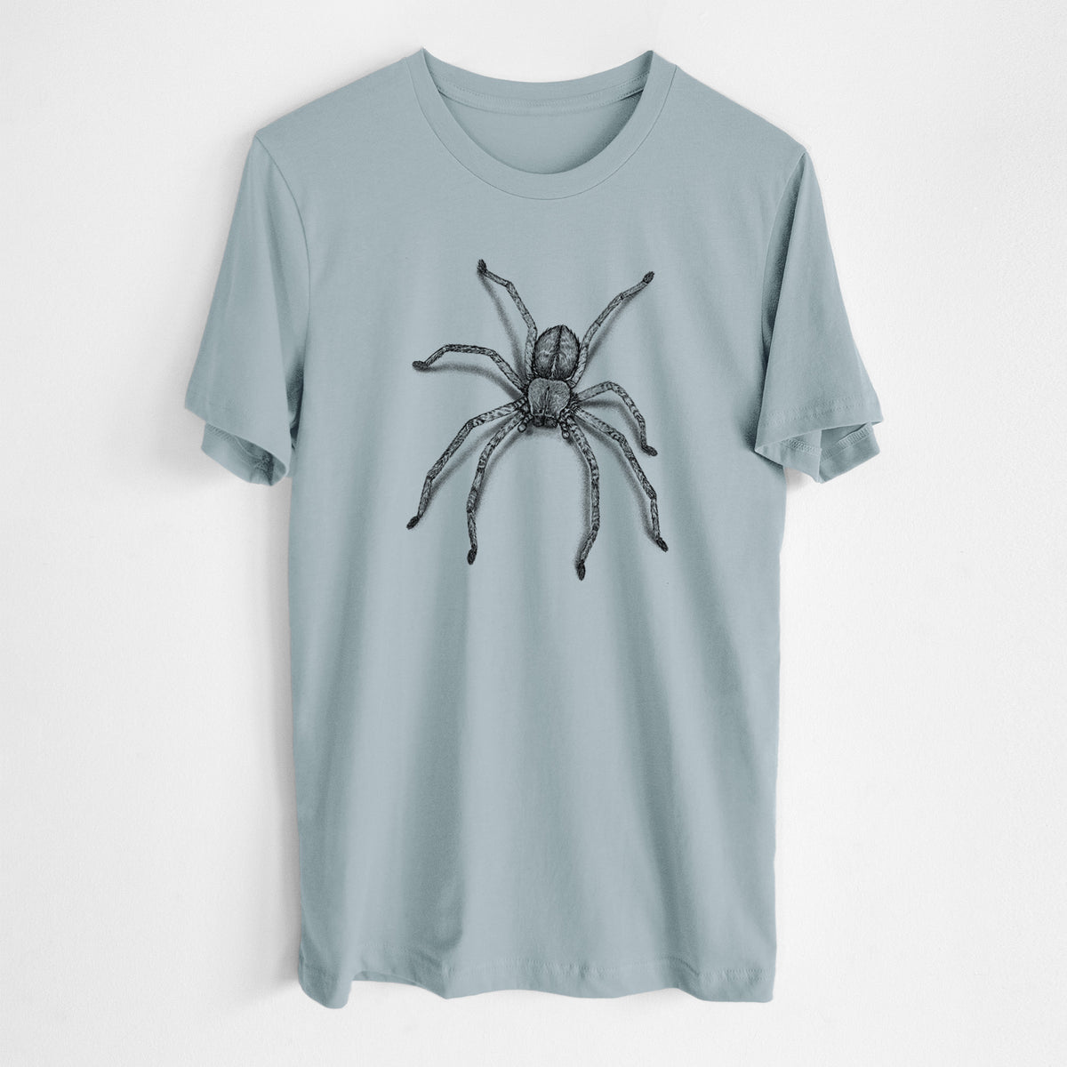 Vintage denim lightweight cotton t-shirt laid flat, printed with a detailed black ink illustration of a huntsman spider with long legs spread.