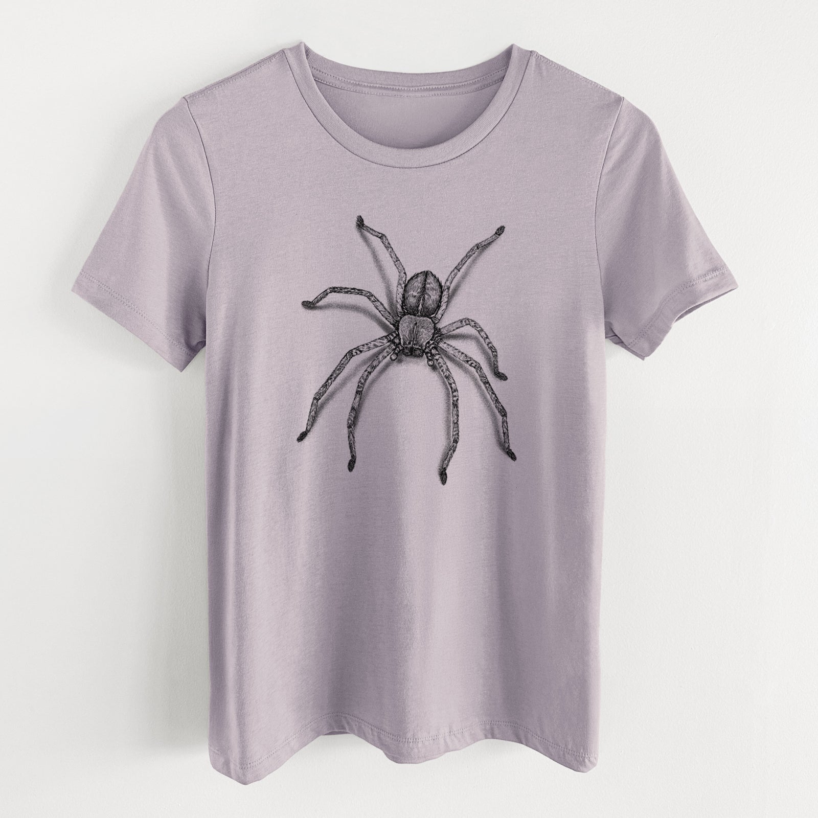 Light violet women's relaxed fit cotton t-shirt laid flat, printed with a detailed black ink illustration of a huntsman spider with long legs spread.