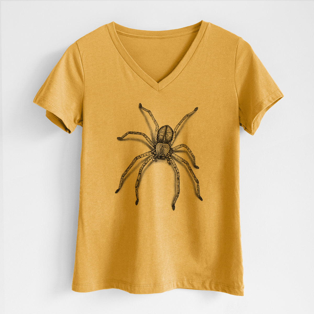 Honeycomb yellow women's relaxed fit cotton V-neck t-shirt laid flat, printed with a detailed black ink illustration of a huntsman spider with long legs spread.