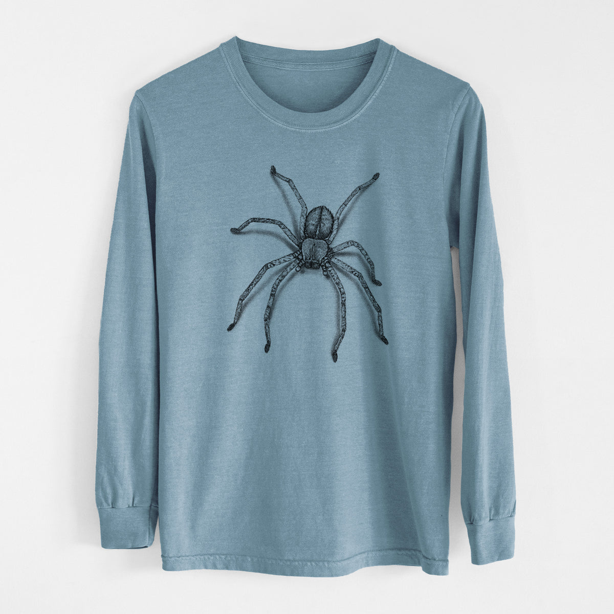 Steel blue Comfort Colors long sleeve shirt laid flat, printed with a detailed black ink illustration of a huntsman spider with long legs spread.