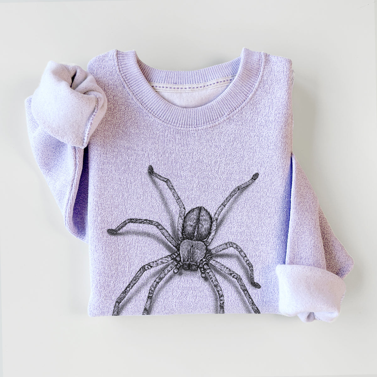 Ice purple knit sweatshirt printed with a detailed black ink illustration of a huntsman spider with long legs spread, styled flat.