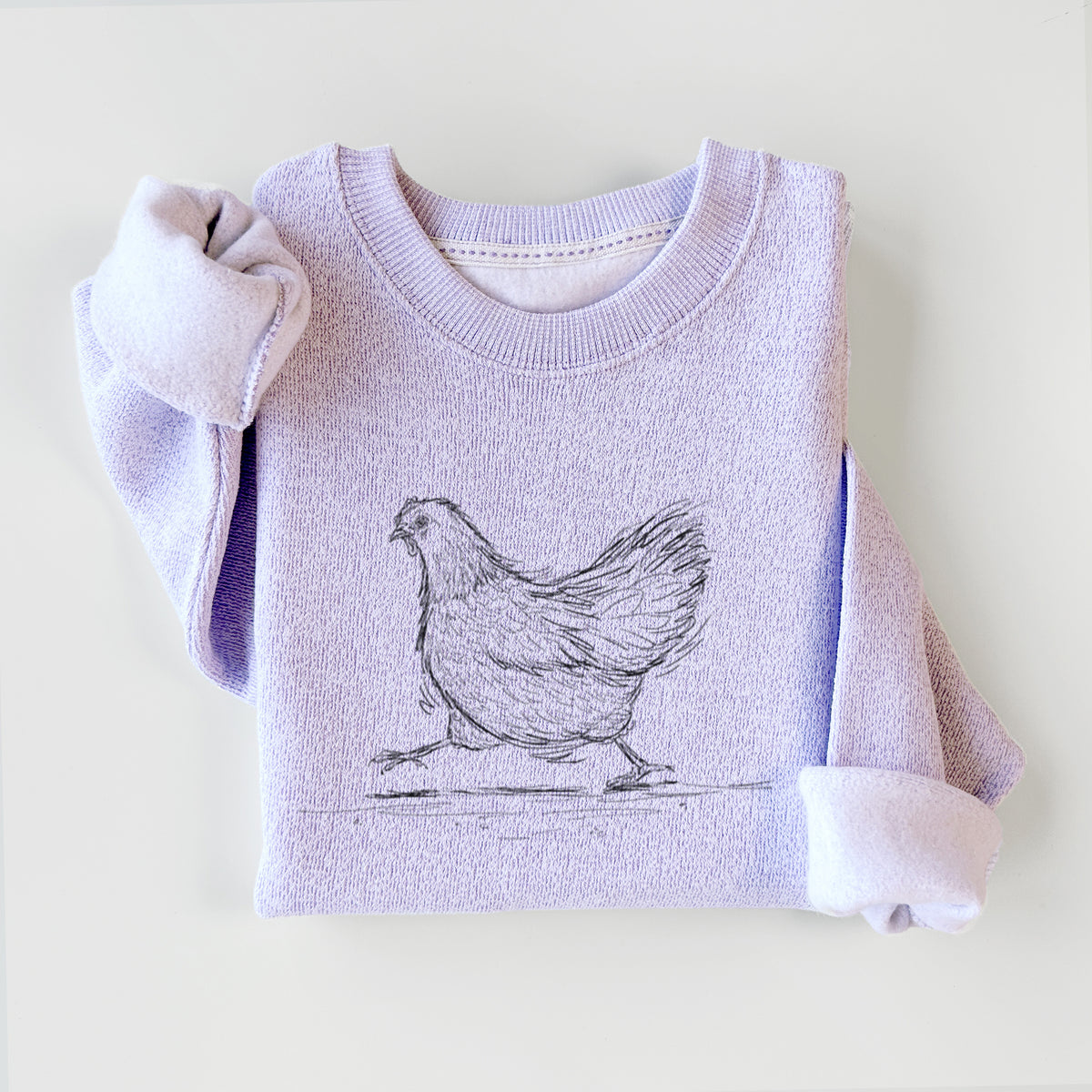 Ice purple knit sweatshirt printed with a black ink sketch of a hen hurrying along, styled flat.