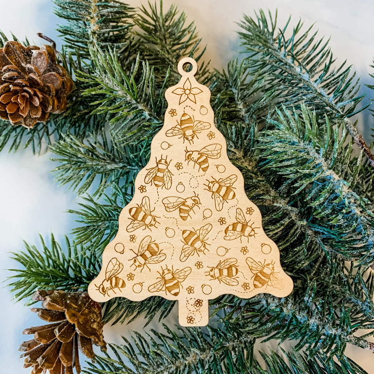 Product photo of the BeCause Tees Christmas Tree of Bees Wooden Ornament.