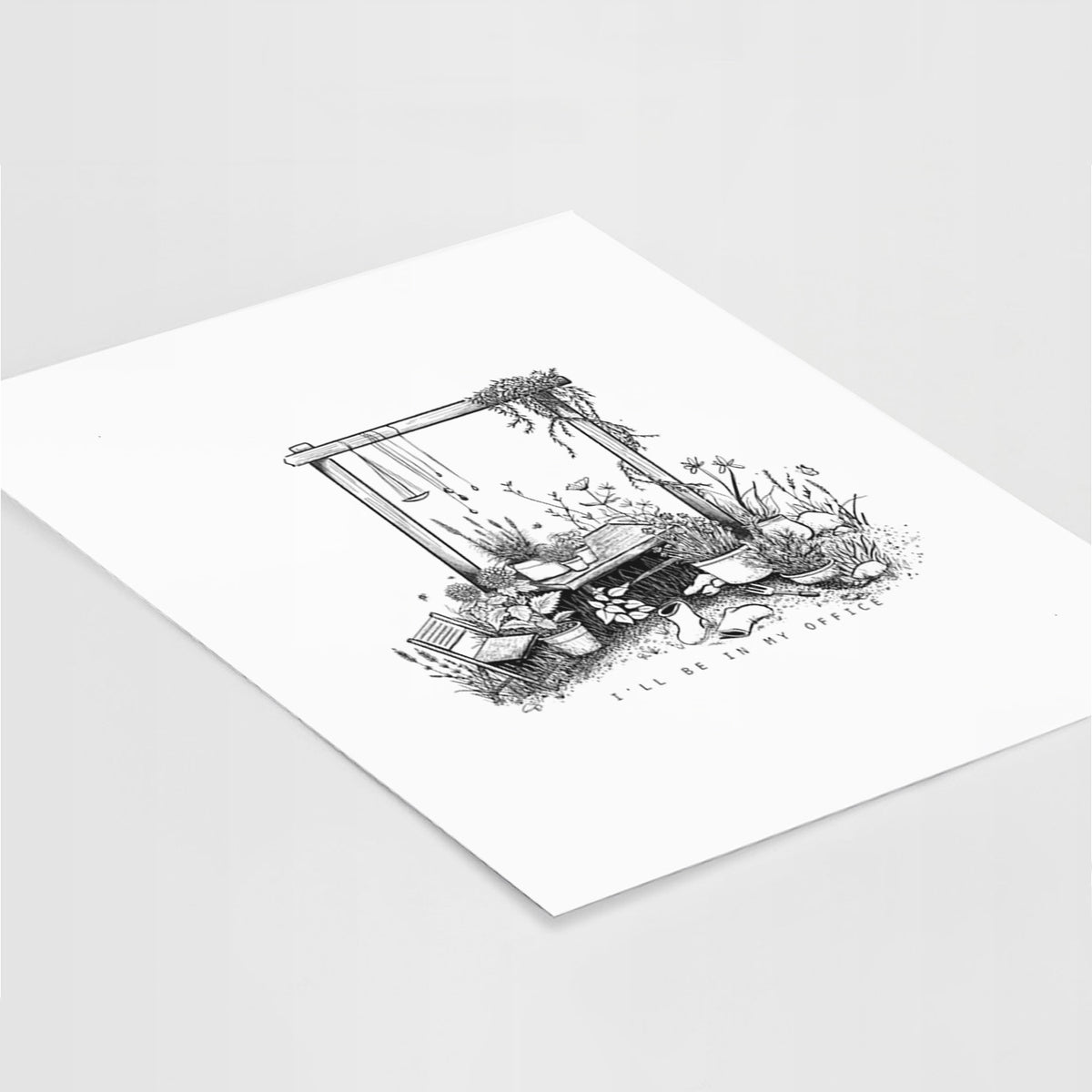 Art print of a black ink illustration of a garden gate arch surrounded by potted plants and flowers, lying at an angle on a white surface.