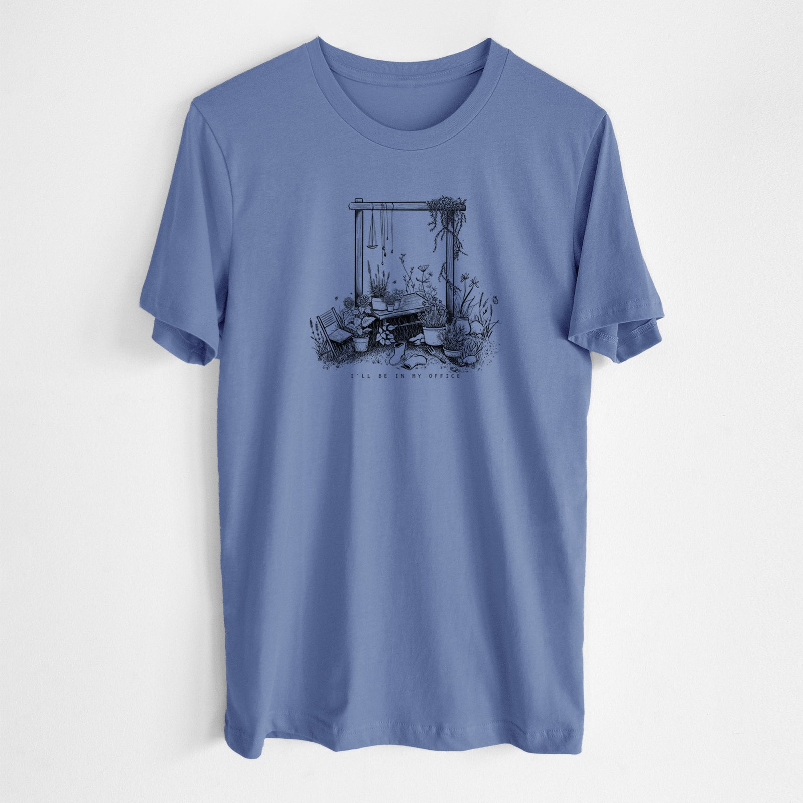 Blue bell lightweight cotton t-shirt laid flat, printed with a black ink illustration of a garden gate arch surrounded by potted plants and flowers.