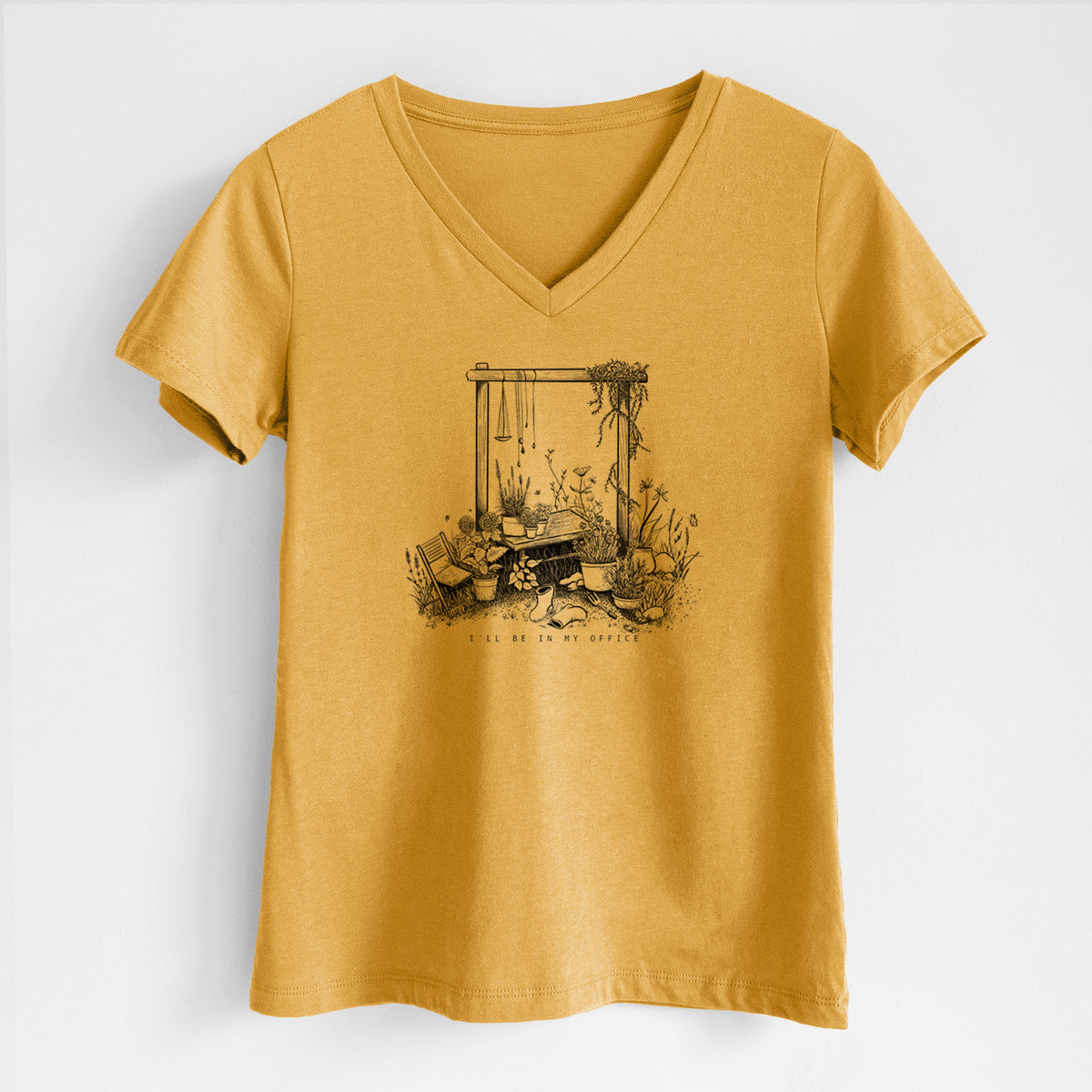 Honeycomb yellow women's relaxed fit cotton V-neck t-shirt laid flat, printed with a black ink illustration of a garden gate arch surrounded by potted plants and flowers.