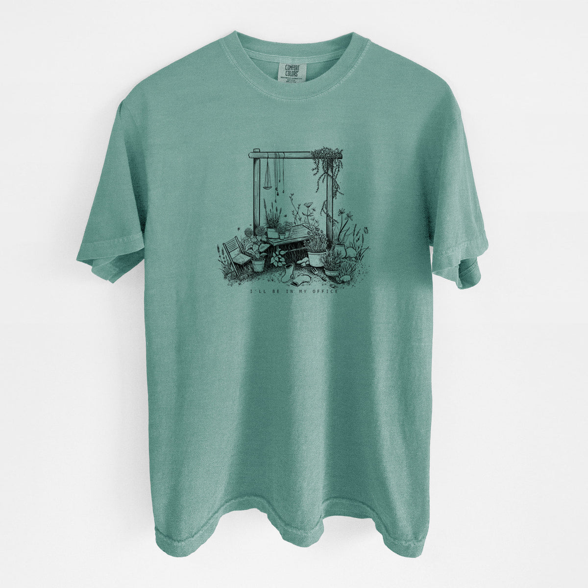 Reef green Comfort Colors t-shirt laid flat, printed with a black ink illustration of a garden gate arch surrounded by potted plants and flowers.