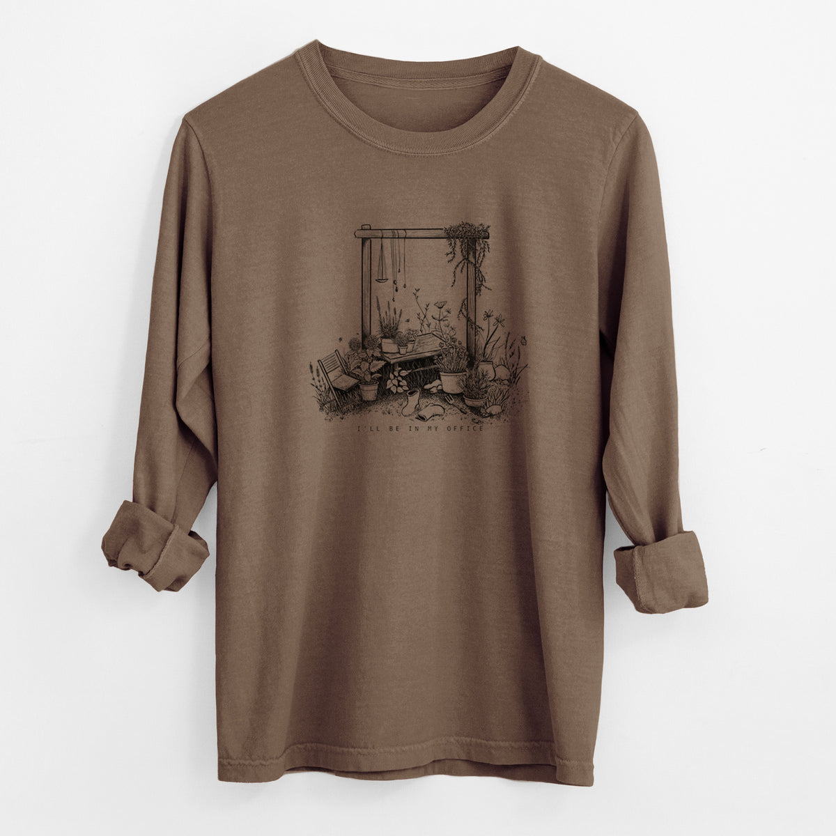Espresso brown Comfort Colors long sleeve shirt laid flat with the cuffs rolled, printed with a black ink illustration of a garden gate arch surrounded by potted plants and flowers.
