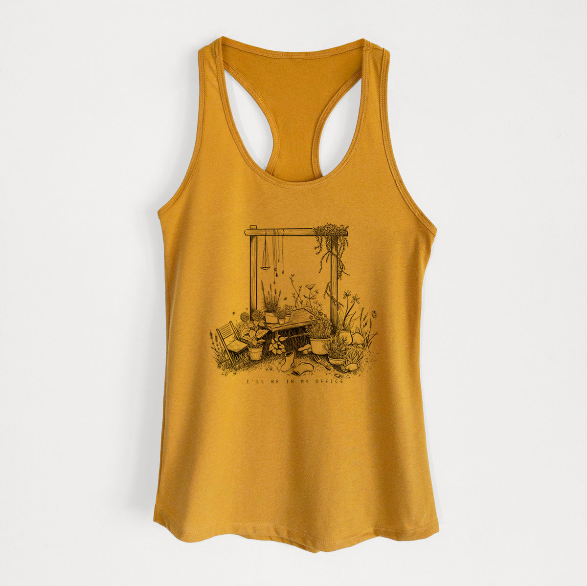 Gold women's racerback tank top laid flat, printed with a black ink illustration of a garden gate arch surrounded by potted plants and flowers.