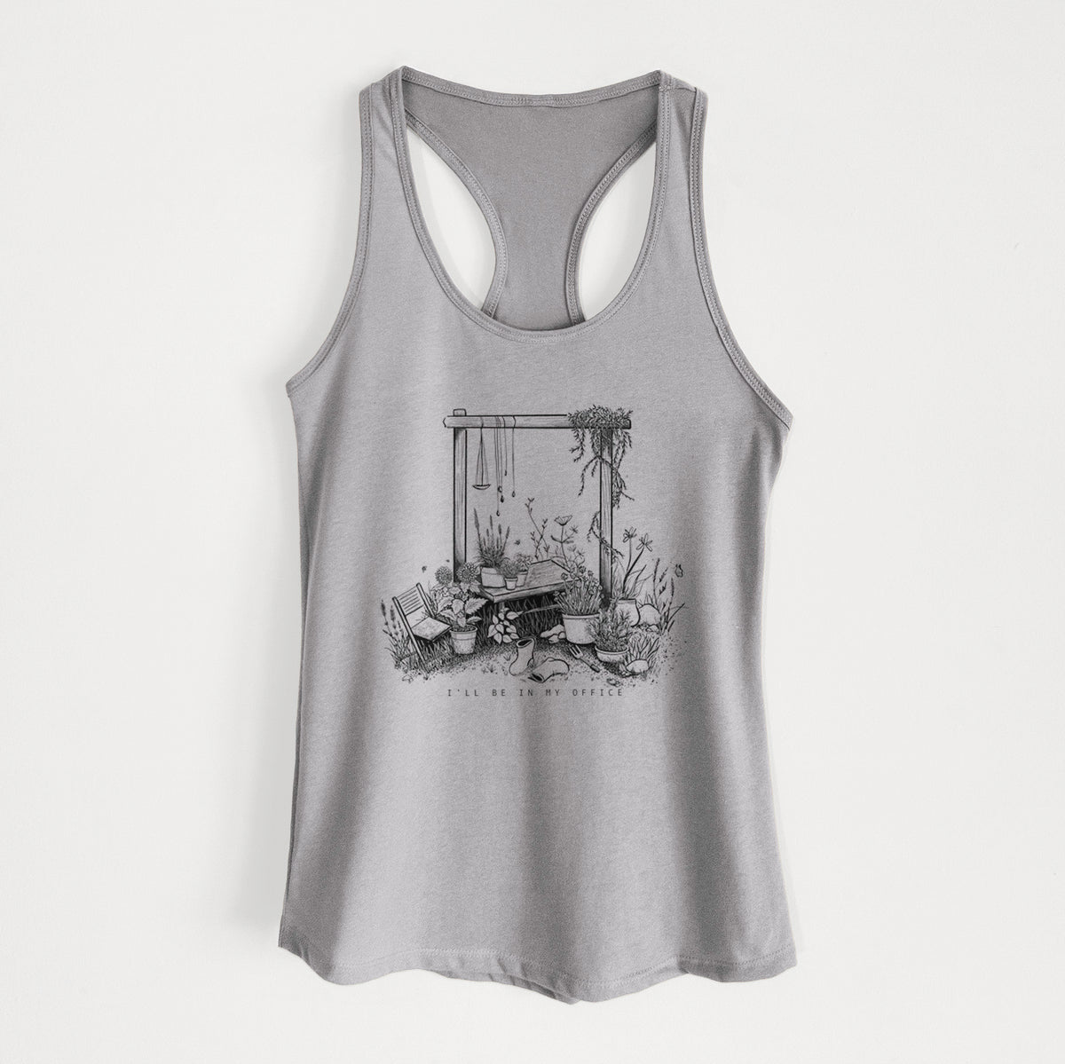 Heather grey women's racerback tank top laid flat, printed with a black ink illustration of a garden gate arch surrounded by potted plants and flowers.