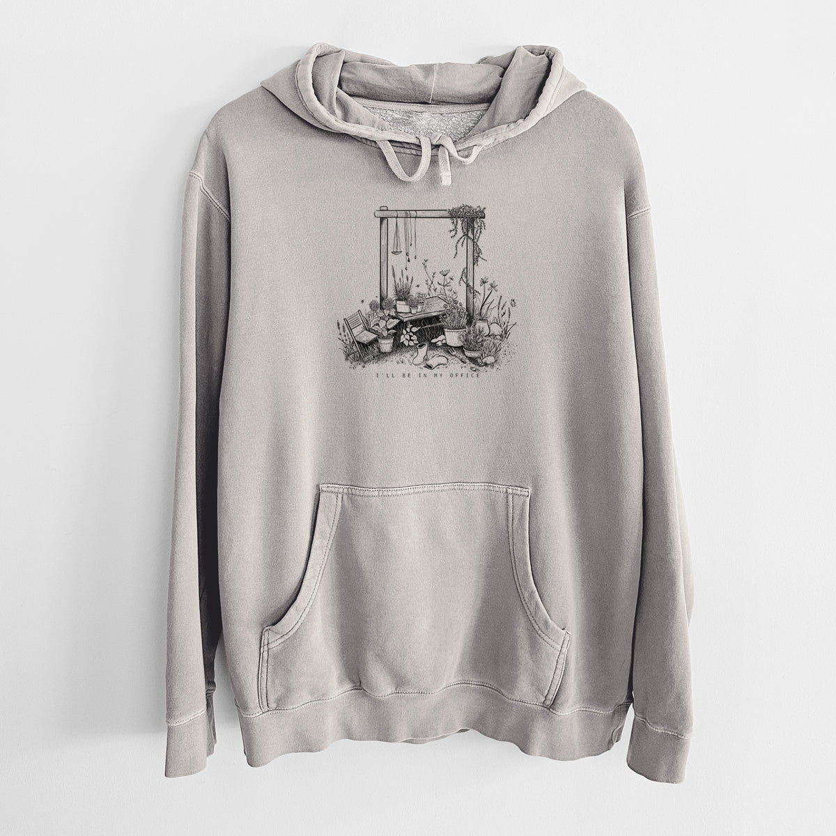 Cement grey pigment dyed hoodie laid flat, printed with a black ink illustration of a garden gate arch surrounded by potted plants and flowers.