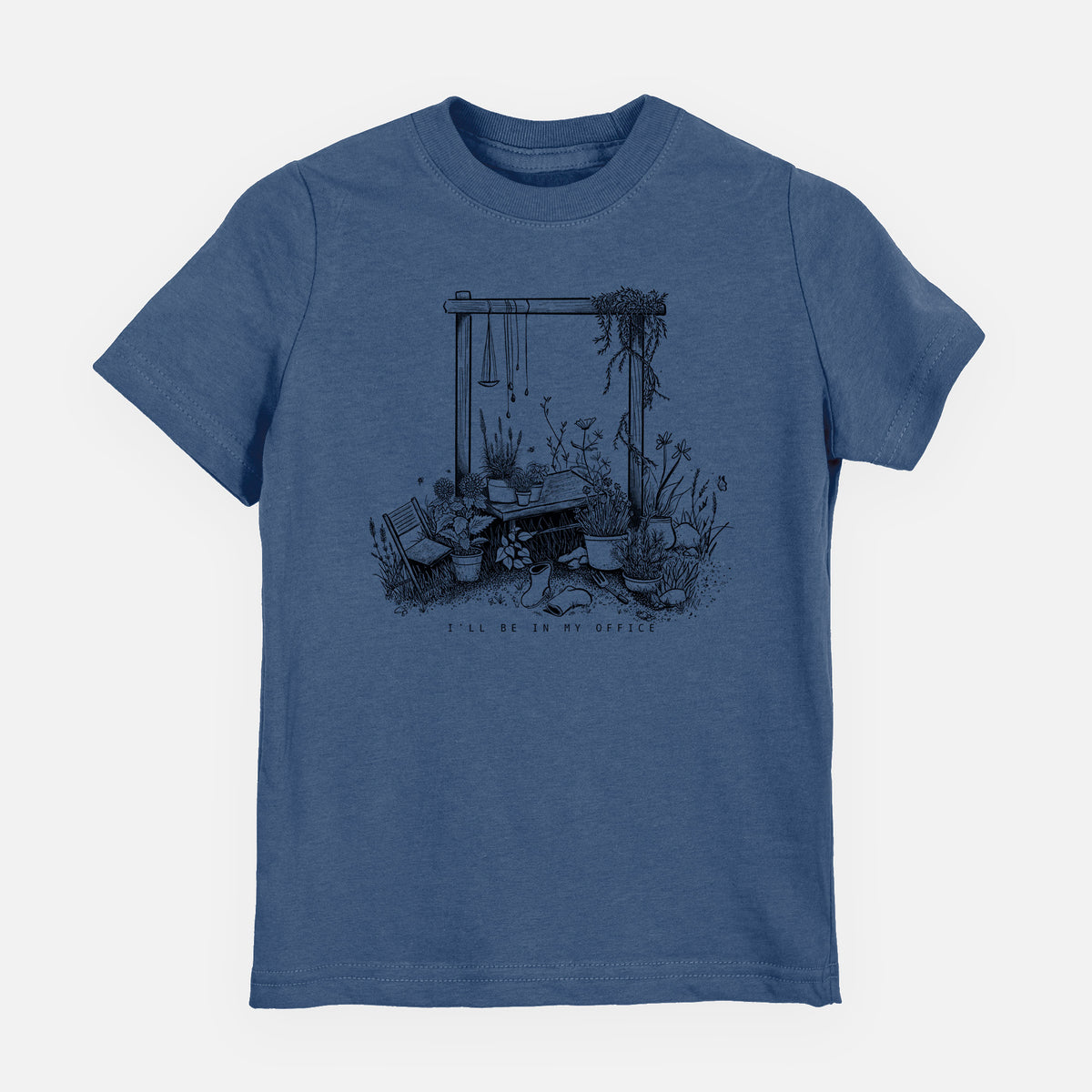 Indigo blue youth t-shirt laid flat, printed with a black ink illustration of a garden gate arch surrounded by potted plants and flowers.