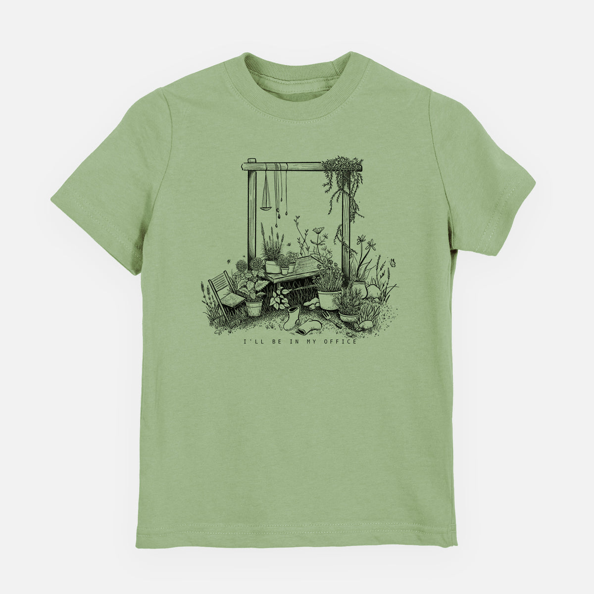 Sage green youth t-shirt laid flat, printed with a black ink illustration of a garden gate arch surrounded by potted plants and flowers.