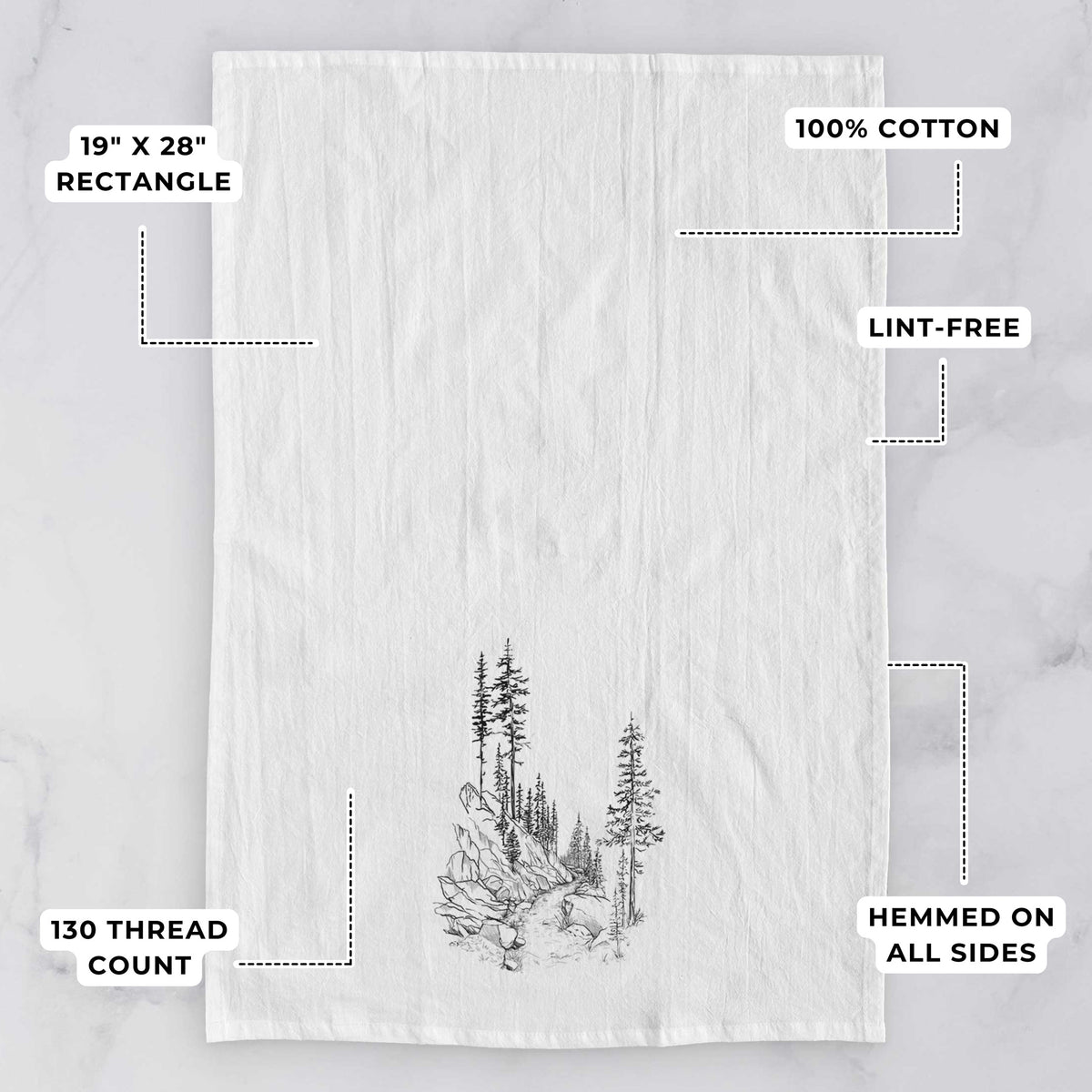 White tea towel printed with a black ink illustration of a trail winding past tall pine trees and rocks into the woods, with feature labels: 19 by 28 inch rectangle, 100% cotton, lint-free, 130 thread count, hemmed on all sides.