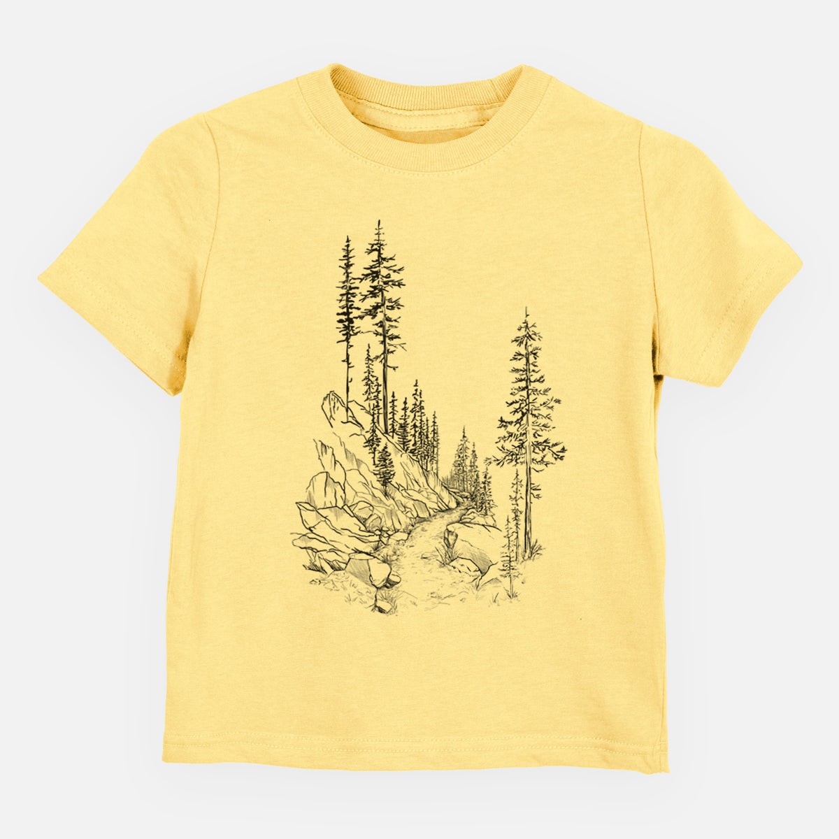 Butter yellow toddler t-shirt laid flat, printed with a black ink illustration of a trail winding past tall pine trees and rocks into the woods.