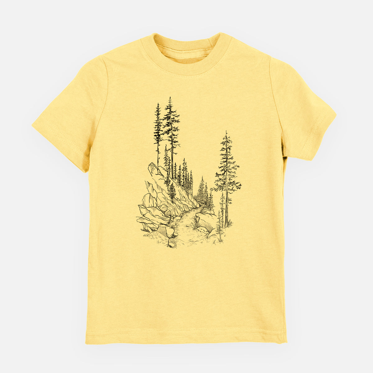 Butter yellow youth t-shirt laid flat, printed with a black ink illustration of a trail winding past tall pine trees and rocks into the woods.