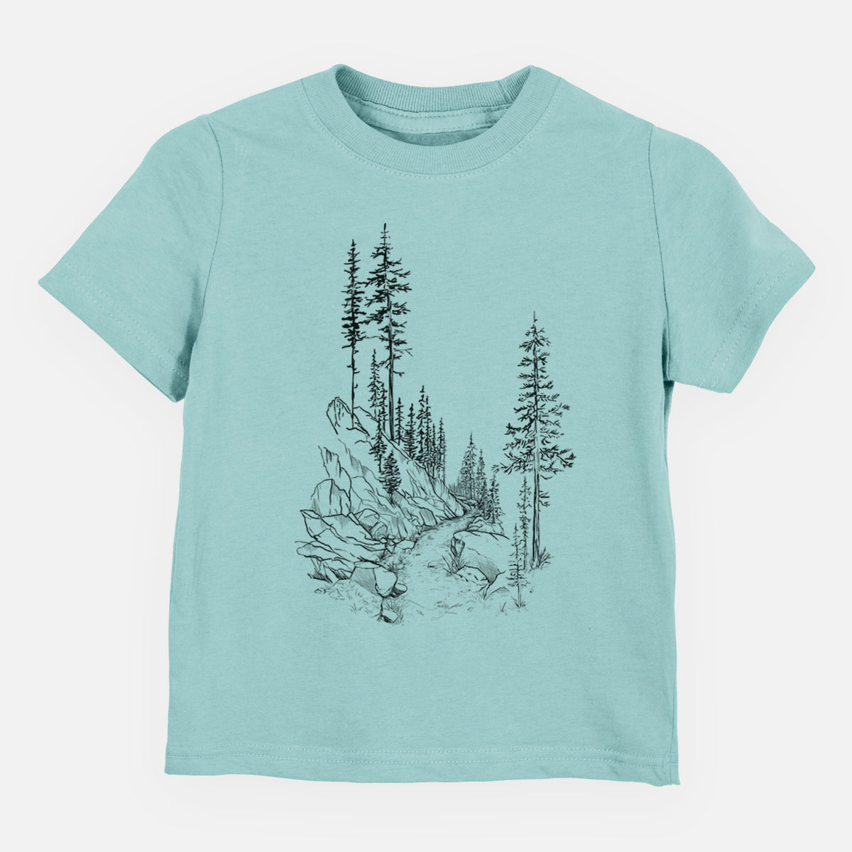 Saltwater toddler t-shirt laid flat, printed with a black ink illustration of a trail winding past tall pine trees and rocks into the woods.