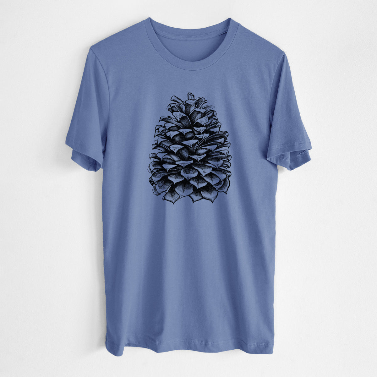 Blue bell lightweight cotton t-shirt laid flat, printed with a detailed black ink illustration of a large Jeffrey pine cone.