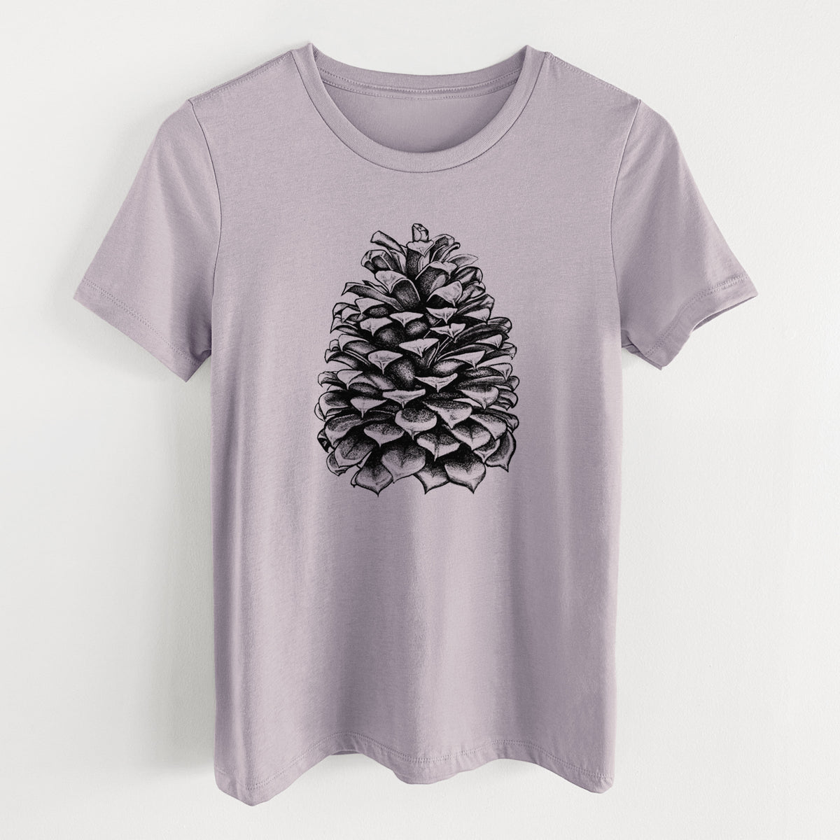 Light violet women's relaxed fit cotton t-shirt laid flat, printed with a detailed black ink illustration of a large Jeffrey pine cone.