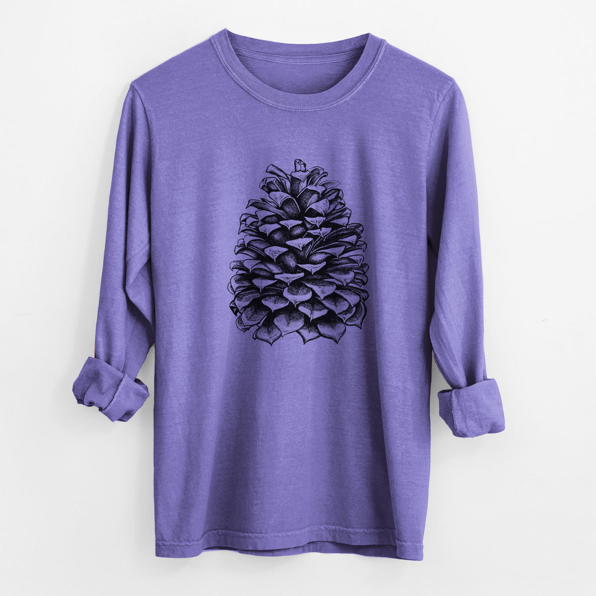 Violet purple Comfort Colors long sleeve shirt laid flat with the cuffs rolled, printed with a detailed black ink illustration of a large Jeffrey pine cone.