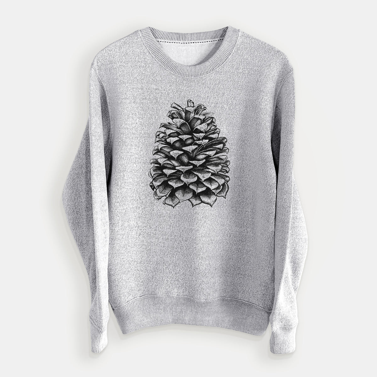 Salt and pepper knit sweatshirt laid flat, printed with a detailed black ink illustration of a large Jeffrey pine cone.