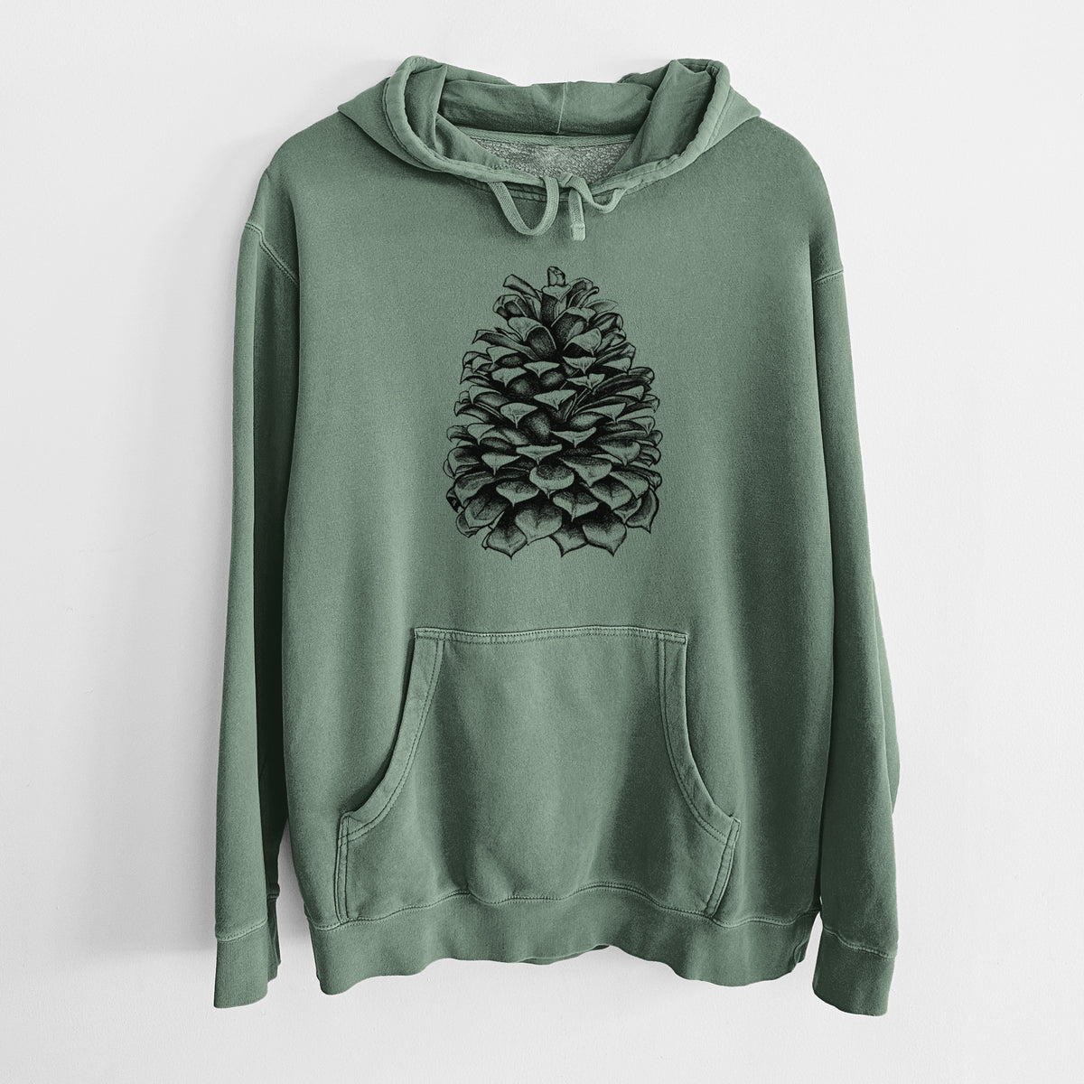 Alpine green pigment dyed hoodie laid flat, printed with a detailed black ink illustration of a large Jeffrey pine cone.
