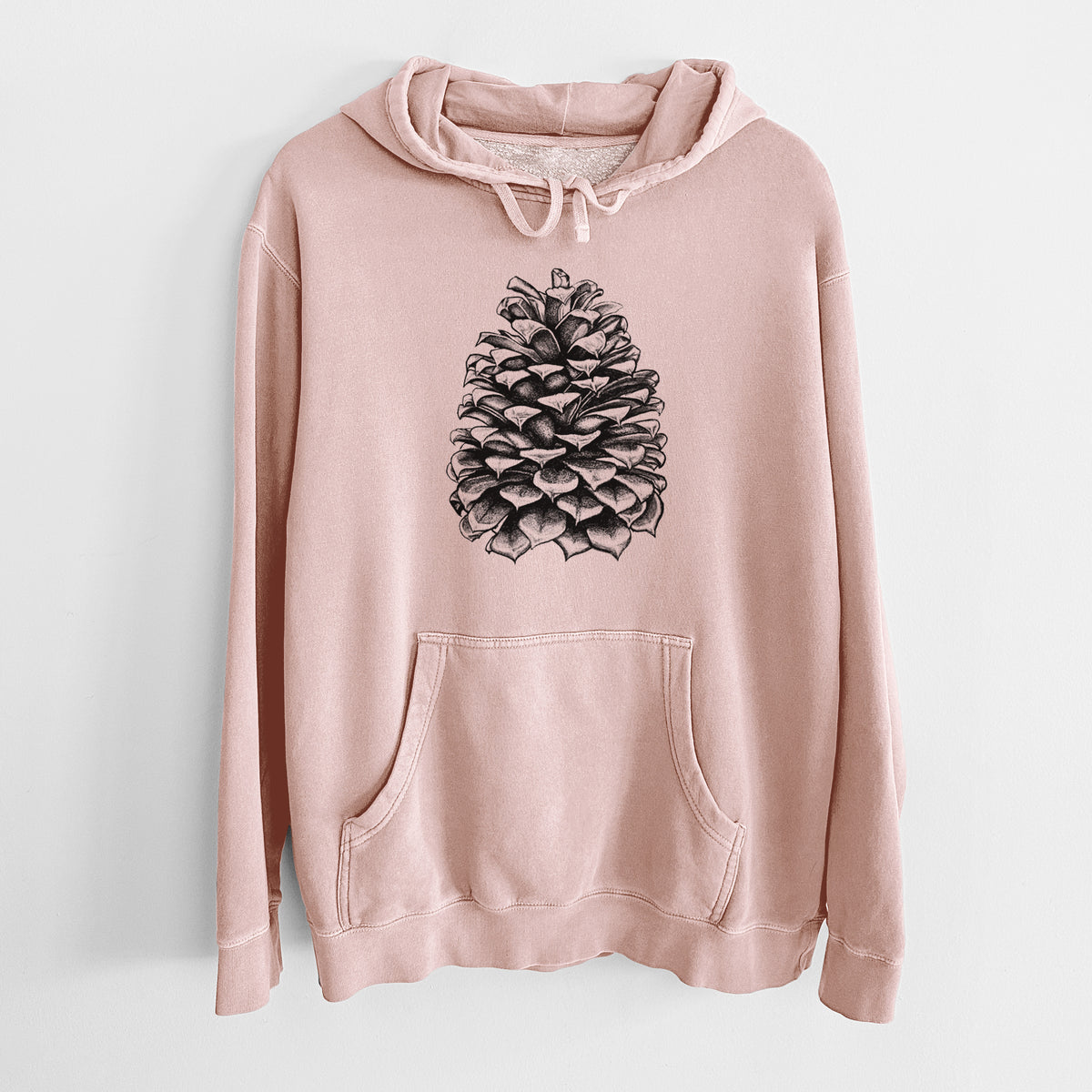 Dusty pink pigment dyed hoodie laid flat, printed with a detailed black ink illustration of a large Jeffrey pine cone.