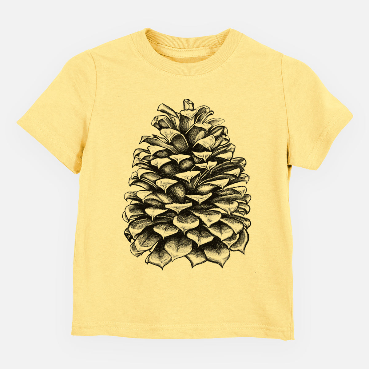Butter yellow toddler t-shirt laid flat, printed with a detailed black ink illustration of a large Jeffrey pine cone.